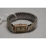 A vintage 9ct rose gold wrist watch by CIMREX having Arabic numeral dial to rectangular face on