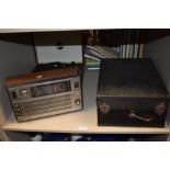 An early 20th century Colombia no.202 gramophone with a modern Retro club record player and a Selena