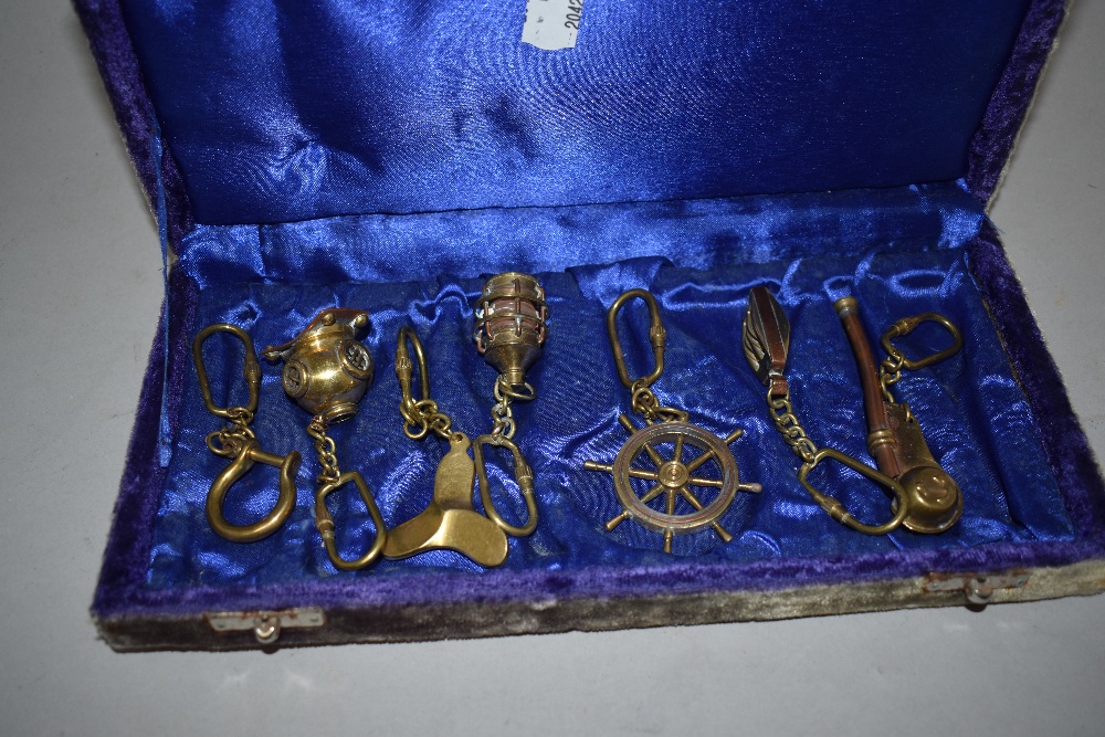 A boxed collection of brass and copper maritime related key rings/ carabenas, a reproduction - Image 2 of 2