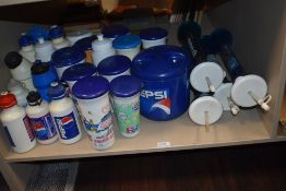 A selection of 20th century Pepsi advertising water bottles and cups etc