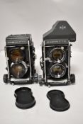 Two Mamiya cameras. A Mamiya C330 Professional f with a Mamiya-Sekor 80mm f2,8 lens and a Mamiya