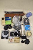 A selection of photographic items including Pentax ME Super A/F, Focus slider, filters, splicer,
