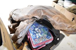 A selection of mixed textiles and clothes including leather jacket