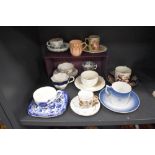 A selection of antique and later tea cup and saucer sets including Royal Copenhagen, Coalport and