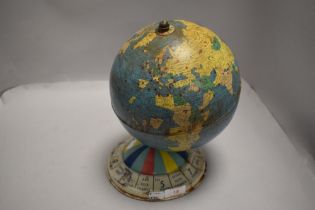 A 20th century tin plate globe possibly from a board game or similar