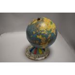 A 20th century tin plate globe possibly from a board game or similar