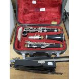 A Yamaha clarinet in case.