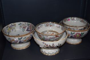 Five Victorian cream ware fruit bowls having footed bases with transfer printed and accented designs