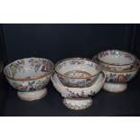 Five Victorian cream ware fruit bowls having footed bases with transfer printed and accented designs