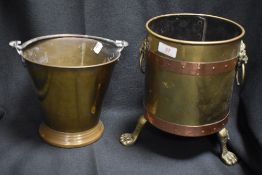 An early 20th century Narang brass ice bucket, with a similar coal bucket with lion head handles and