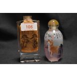 Two Chinese snuff bottles with hand painted decoration within glass bottle, one of two cats and a