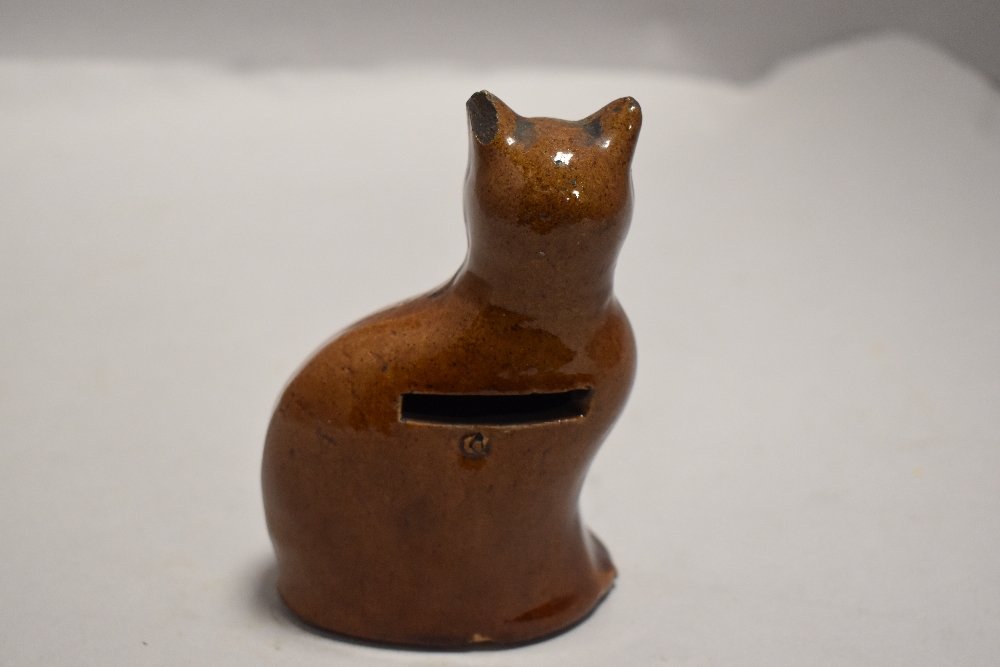 A late 19th century treacle glazed money box or bank in the form of a tabby cat - Bild 2 aus 3