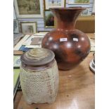 A 20th century Chris Lewis studio pottery lidded container with a large terracotta vase