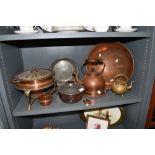 A selection of copper wares including stove kettle, Persepolis spirit pan and sauce pan