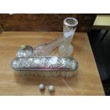 A selection of HM silver scrap items including brush handle and footed base