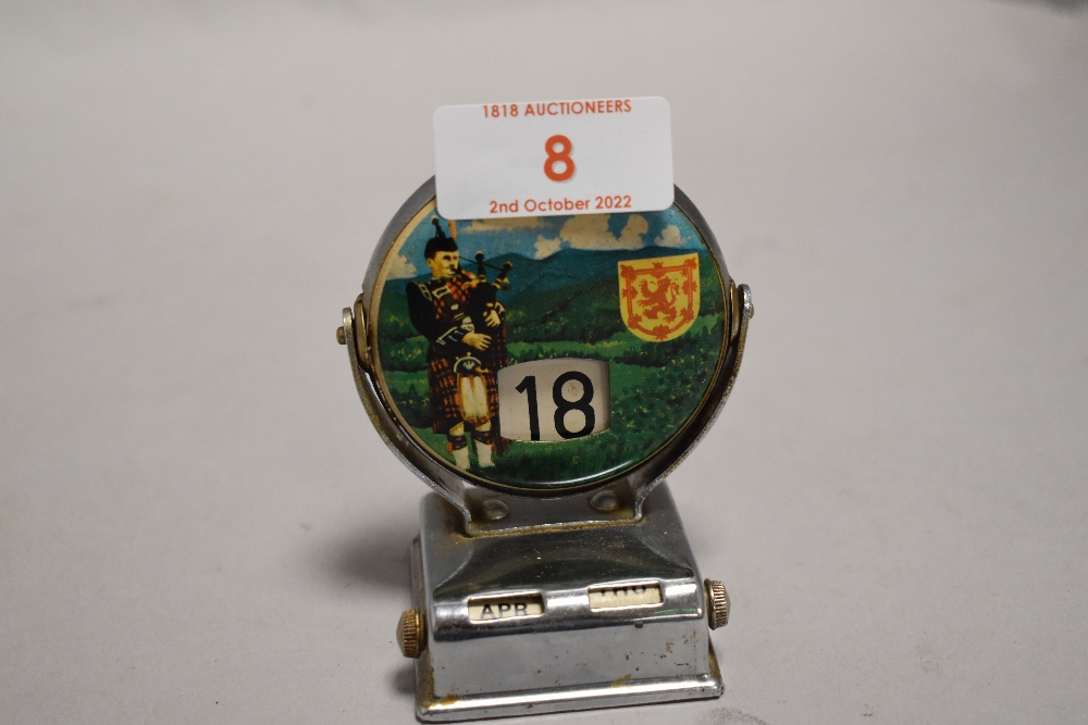 A 20th century desk top revolving calendar with a Scottish design