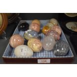 A selection of 20th century semi precious stone and agate eggs