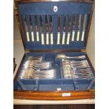 A Mappin and Webb canteen of cutlery in oak case