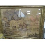 A machine woven tapestry style embroidery of horses at river side in an ornate gilt and gesso frame