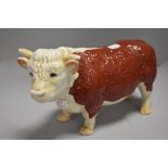 A 20th century ceramic shop display figure of a Hereford bull