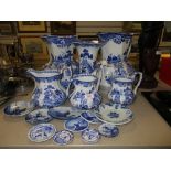 A fine selection of blue and white ware ceramics including graduated Mason's jug set and two large