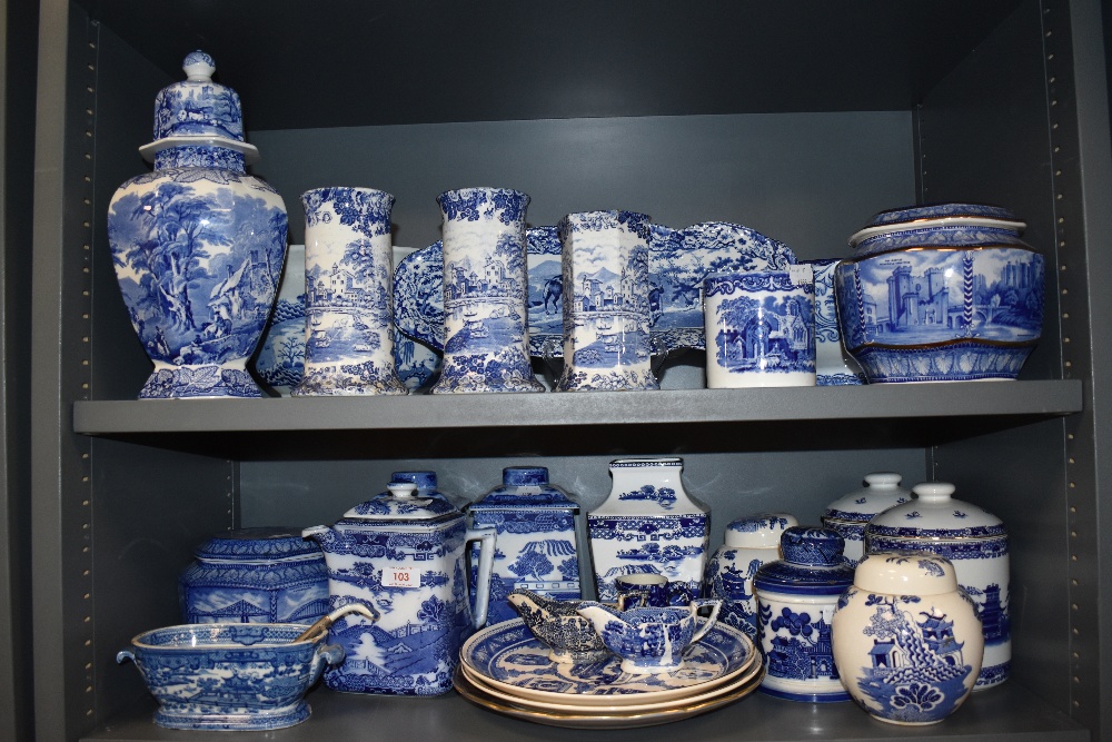 Two shelves of early 20th century Masons, Ringtons and Pratts blue and white ware ceramics