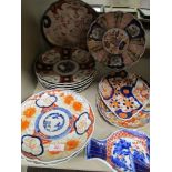 A good selection of antique Japanese Imari wares including fish shape bowl, scalloped plates and