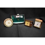 Four 20th century portable alarm clocks including Lorus and Estyma