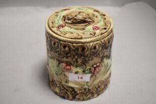A Victorian ceramic tobacco jar with naturalistic form or flowers and tree bark