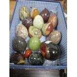 A selection of 20th century semi precious stone and agate stone turned eggs