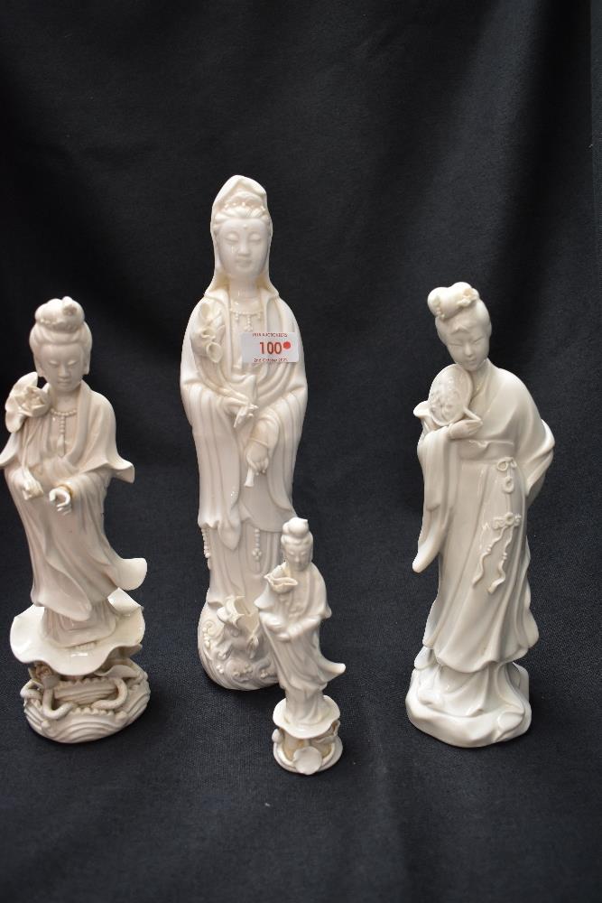 Four Chinese blanc de Chine figures of Guanyin