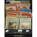 A box of early 20th century road maps and ordnance survey guides including local Lakeland and Isle