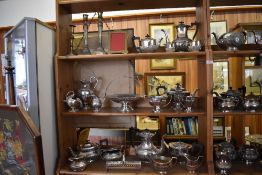 A large quantity of silver plated wares to include four piece teasets, three piece teasets, tray,