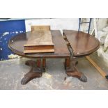 A 20th century banded mahogany extending dining table, in the Victorian style, having moulded edge