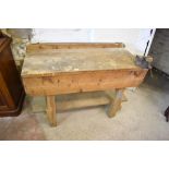 A vintage pine workbench with attached vice to one corner. 81CM X. 122CM.