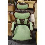 A pair of Edwardian mahogany Art Nouveau armchairs, with shaped, pierced and carved decoration,