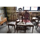 A group of seven miscellaneous chairs to include Edwardian bedroom chair, Victorian oak rush