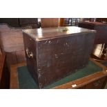 A stained pine box, with brass handle to top and sides. 39CM. X. 58CM.