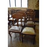 A set of four early 20th century oak Carolean design chairs. Sold together with a set of early