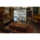 A 19th century crossbanded mahogany swing dressing mirror. the base with two drawers, spotting to