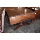 A 19th century mahogany pedestal. Pembroke table the rectangular top with rounded flaps over a