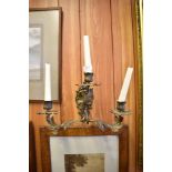 A gilt brass theee branch wall sconce.