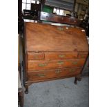 A 19th century Mahogany bureau of traditional design, having fall front over 3/2 drawers, raised