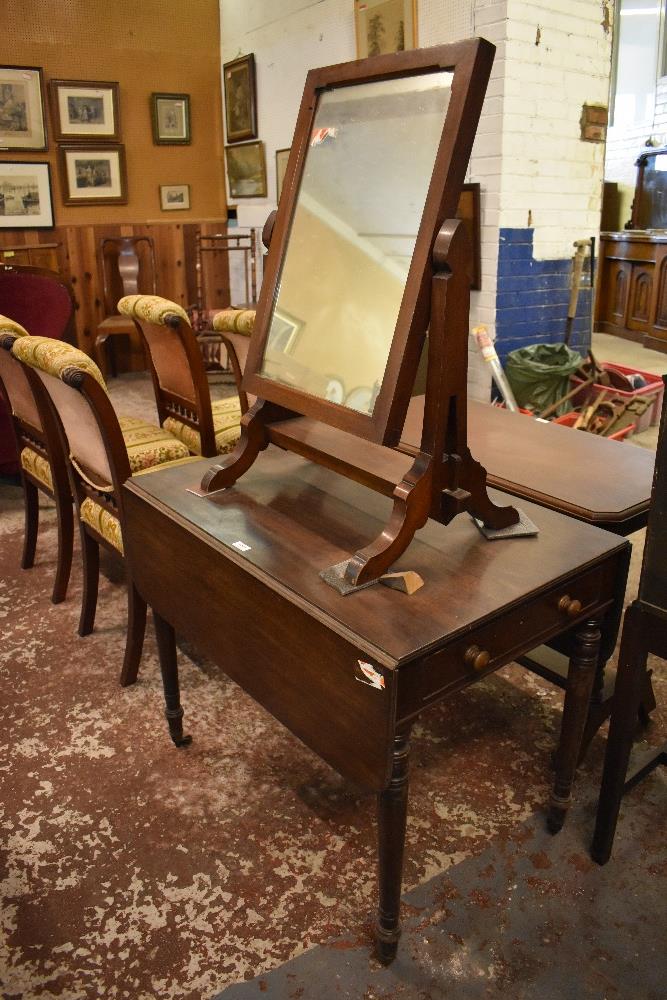 A Victorian mahogany Pembroke table, with reeded edge detail and turned supports, sold together with