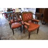 A set of seven late Victorian oak salon chairs, comprising armchair and seven single chairs, each