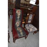 A Victorian upholstered nursing chair, having needlework foliate central stripe. Seat height.