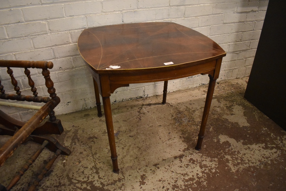 An Edwardian inlaid figured mahogany occasional table, with quarter veneered top over inlaid rails