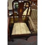 A 1920s mahogany Queen Anne style dining chair. the central vase splat with inlaid conch shell