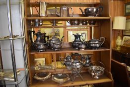 A large quantity of silver plated wares to include spirit kettle four piece tea sets, baskets, bowls