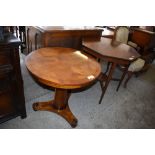 An Edwardian inlaid mahogany octagonal table, sold along with a Victorian circular pedestal table